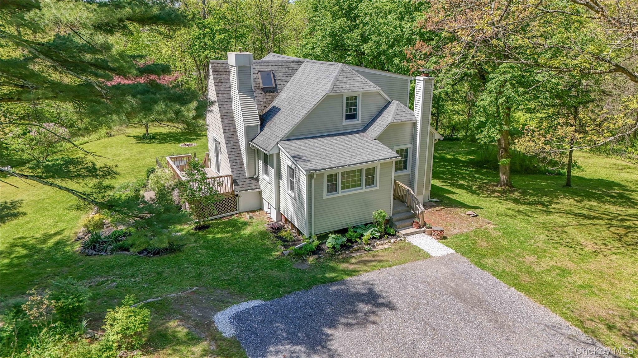 94 Smithtown Road Fishkill, NY 12524 - Photo 9 of 45 a house with green field in front of it