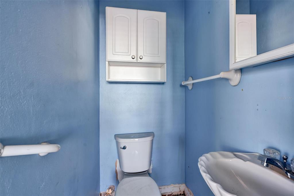 135 143rd Avenue Madeira Beach, FL 33708 - Photo 13 of 20 a bathroom with a toilet