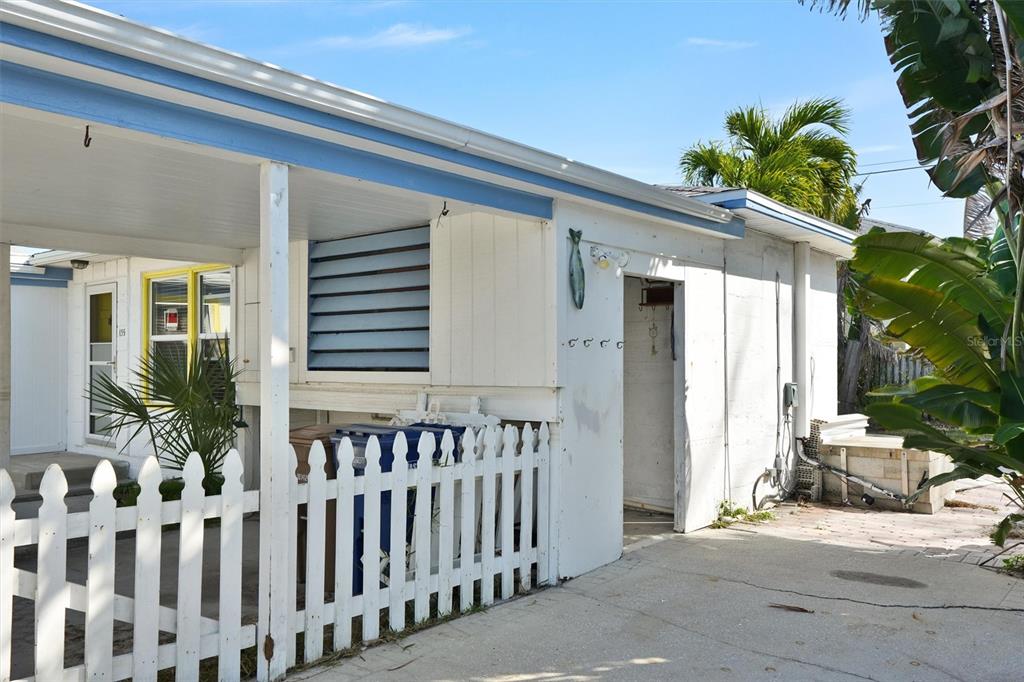 135 143rd Avenue Madeira Beach, FL 33708 - Photo 6 of 20 a view of a house with a porch