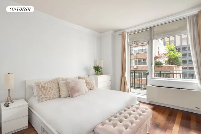 a very nice looking room with wooden floor