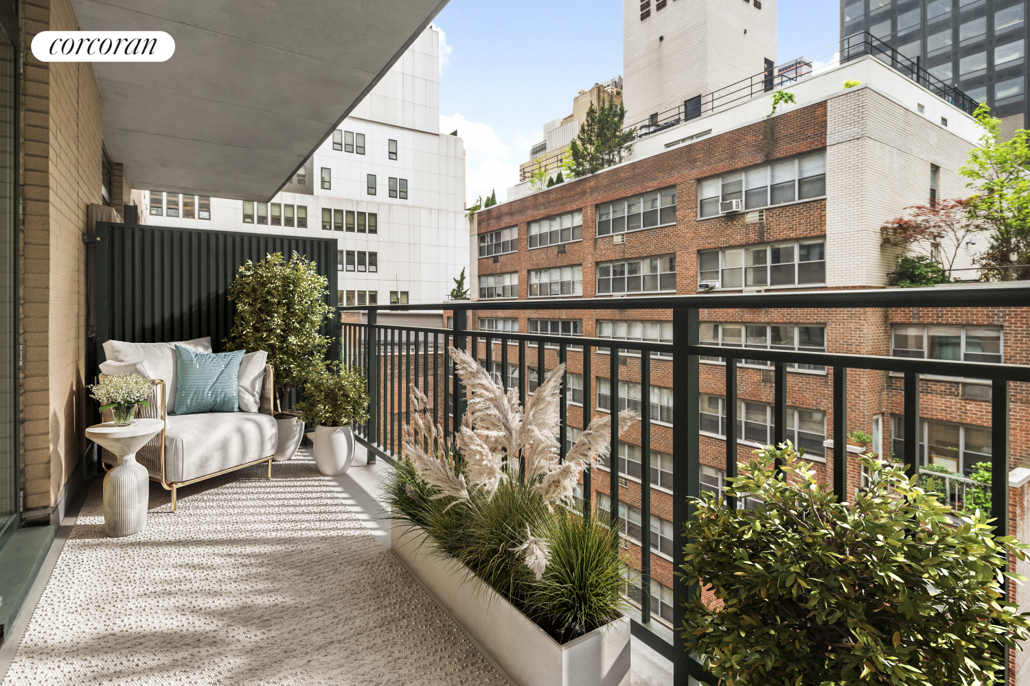 212 East 57th Street, Unit 8C Manhattan, NY 10022 - Photo 6 of 11 a view of a balcony with couches