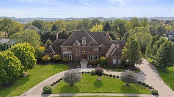 an aerial view of a house with a garden