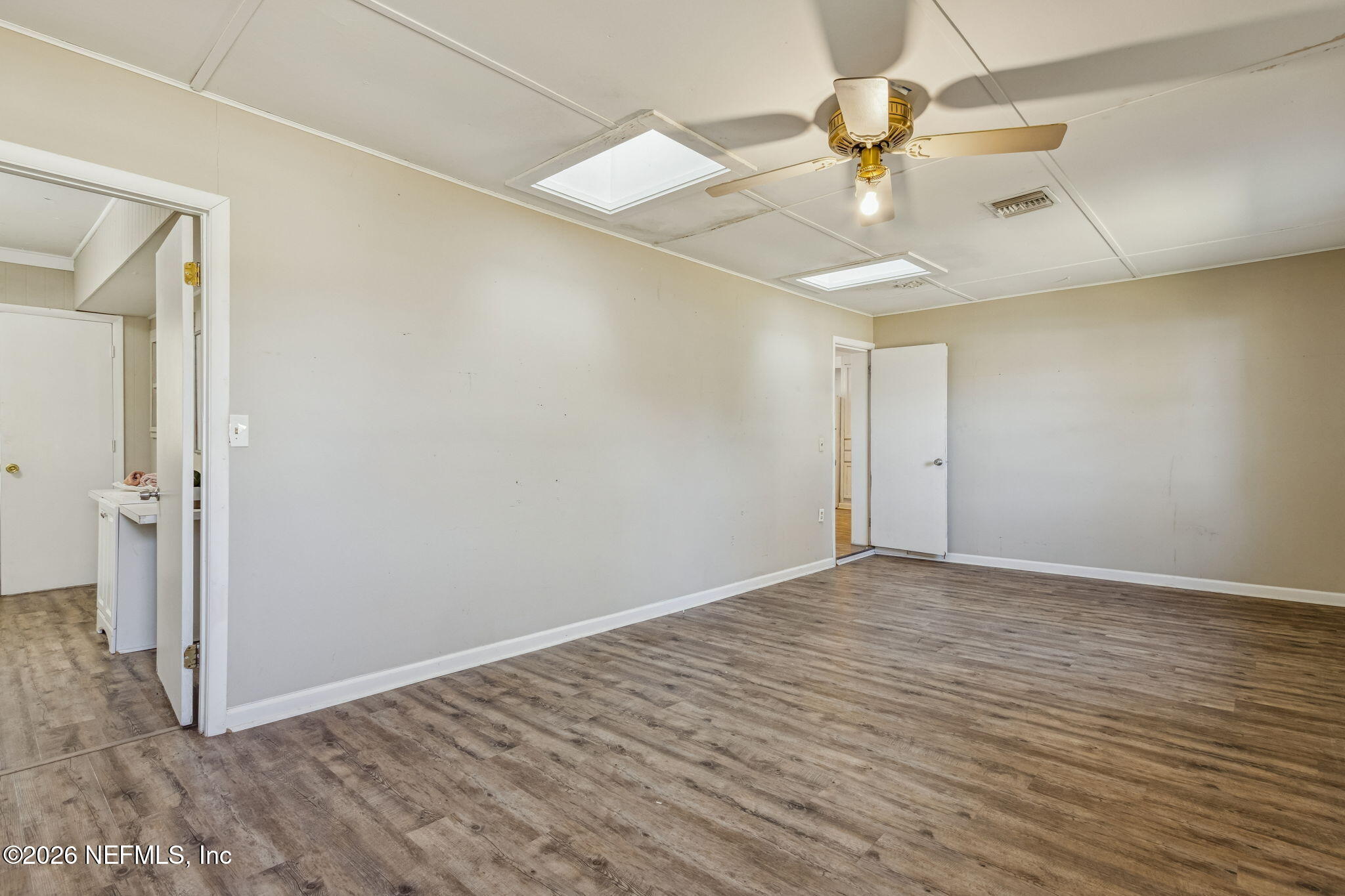 8528 Moody Canal Road St. Augustine, FL 32092 - Photo 26 of 61 a view of an empty room with a window