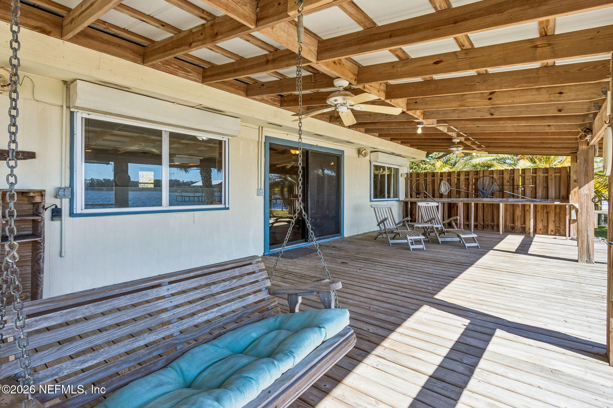 8528 Moody Canal Road St. Augustine, FL 32092 - Photo 32 of 61 a view of a hall with wooden floor