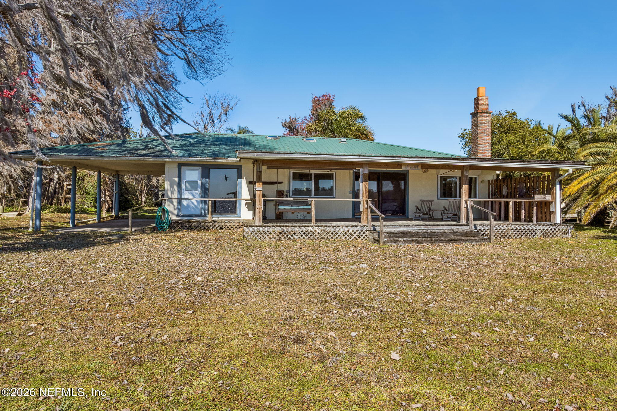 8528 Moody Canal Road St. Augustine, FL 32092 - Photo 35 of 61 front view of a house with a porch