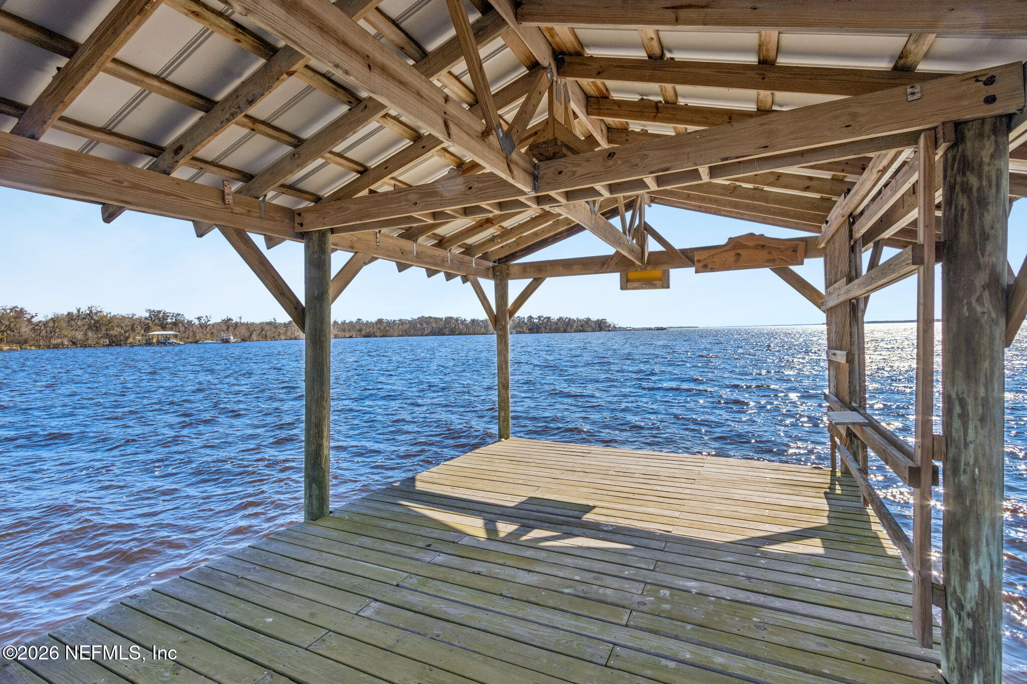 8528 Moody Canal Road St. Augustine, FL 32092 - Photo 39 of 61 a view of outdoor space with wooden deck
