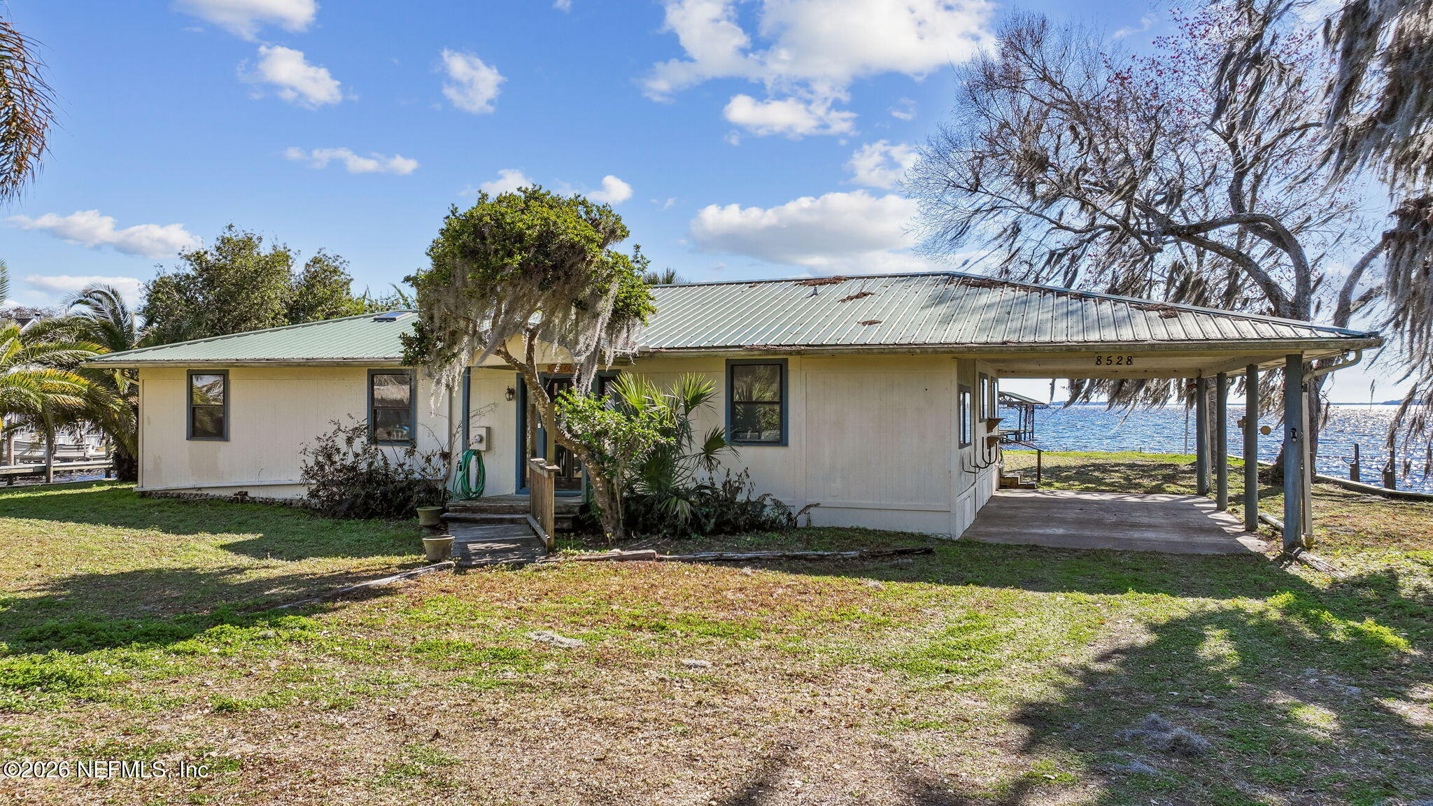 8528 Moody Canal Road St. Augustine, FL 32092 - Photo 45 of 61 a front view of house with yard and green space
