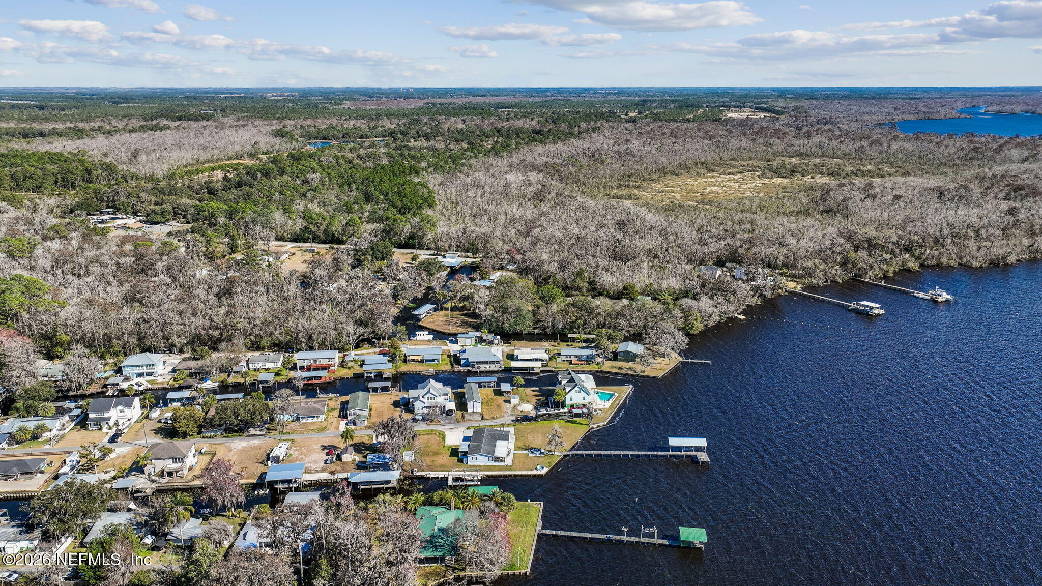 8528 Moody Canal Road St. Augustine, FL 32092 - Photo 51 of 61 an aerial view of residential building with ocean view