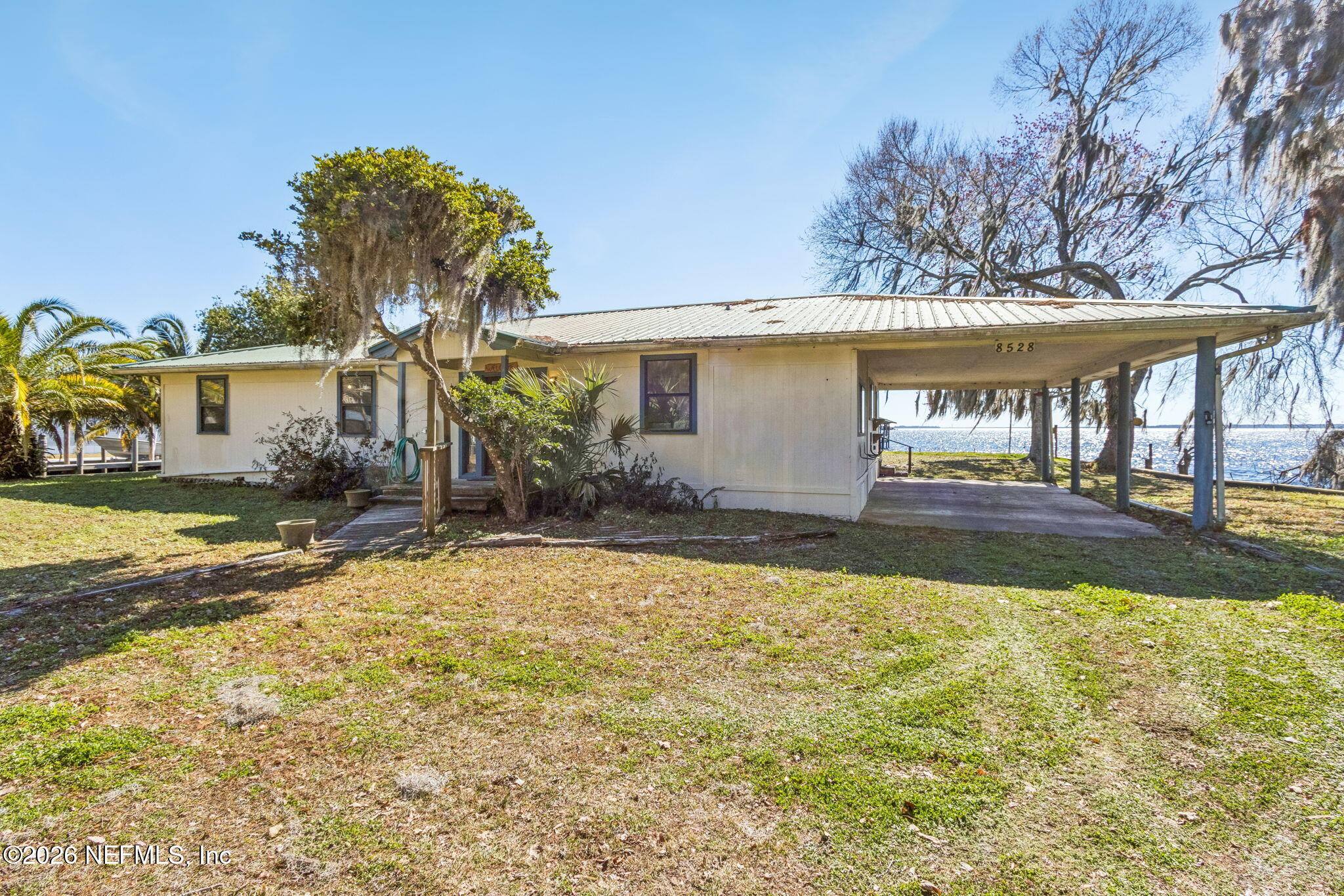 8528 Moody Canal Road St. Augustine, FL 32092 - Photo 61 of 61 a view of a house with basketball court