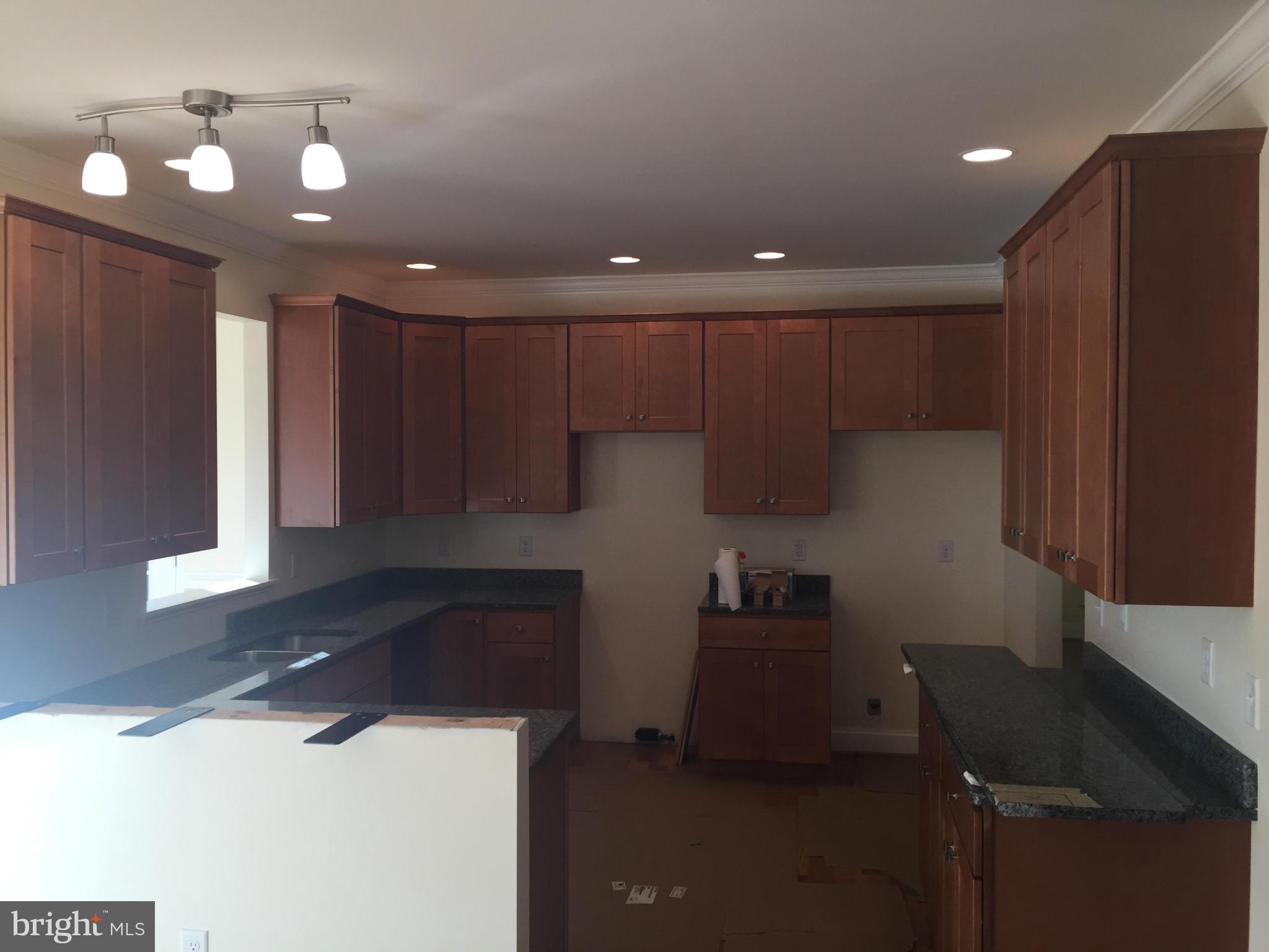 877 Adams Road Winchester, VA 22603 - Photo 7 of 27 Kitchen w/ Breakfast Bar