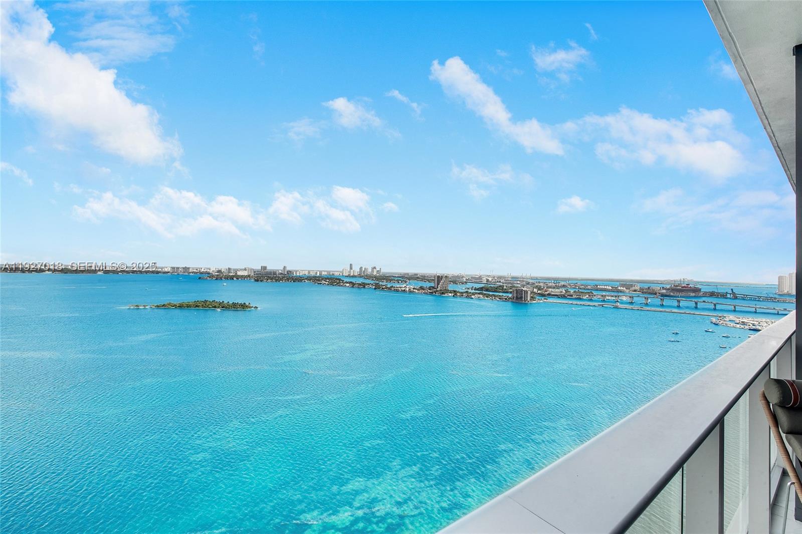a view of a lake from a balcony