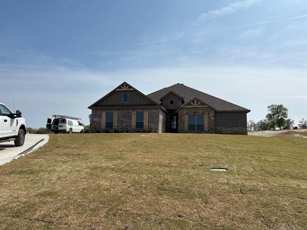 8028 Ranch View Springtown, TX 76082 - Photo 1 of 1 a house with a outdoor space