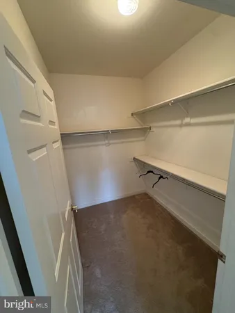 a view of empty room with windows