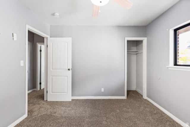 2576 Gramercy Avenue Ogden, UT 84401 - Photo 12 of 20 Unfurnished bedroom with a closet, carpet flooring, and a ceiling fan
