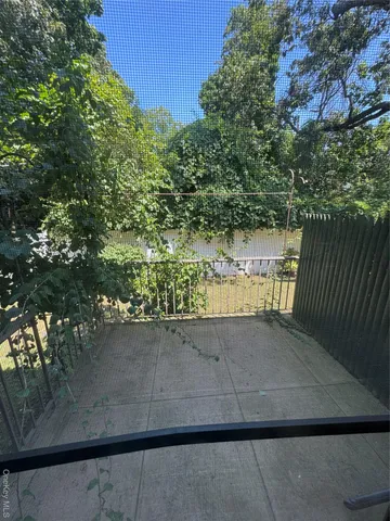 a view of backyard with green space