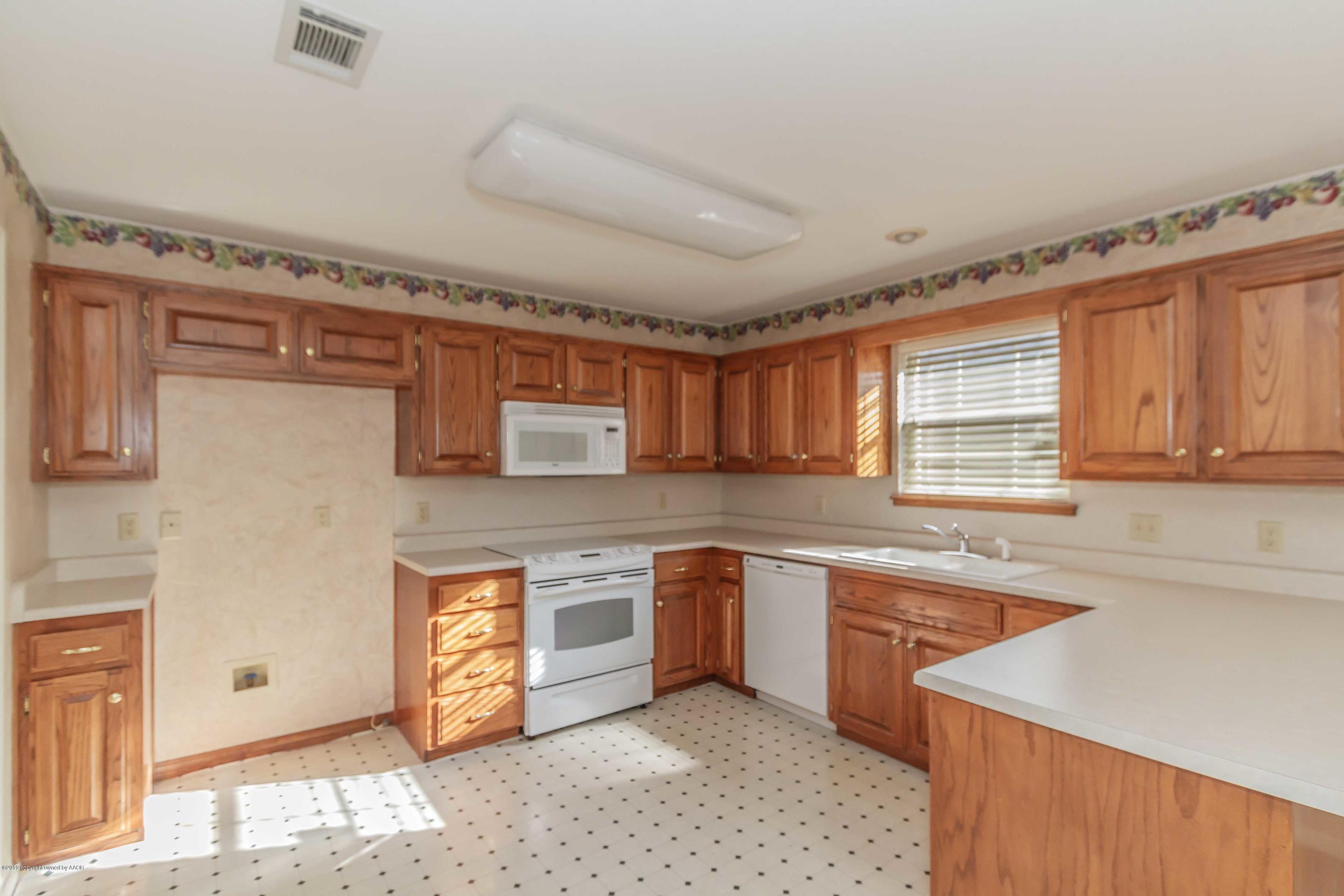 7004 Learning Tree Avenue Amarillo, TX 79119 - Photo 7 of 30 KITCHEN VIEW 1