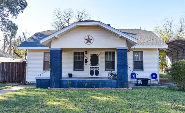 a front view of house with yard