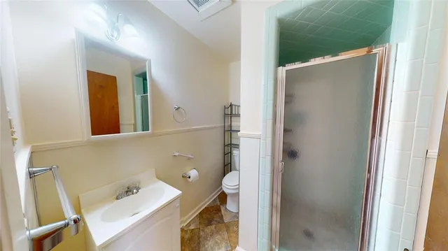 a bathroom with a bathtub and a sink