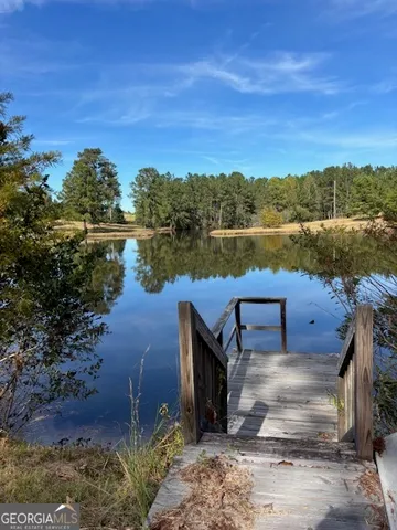a view of a lake with a outdoor space