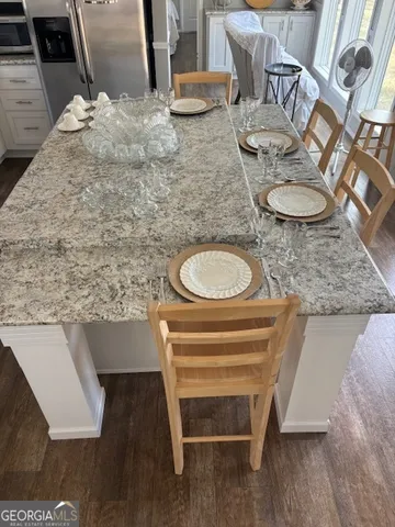 a house view with a backyard space