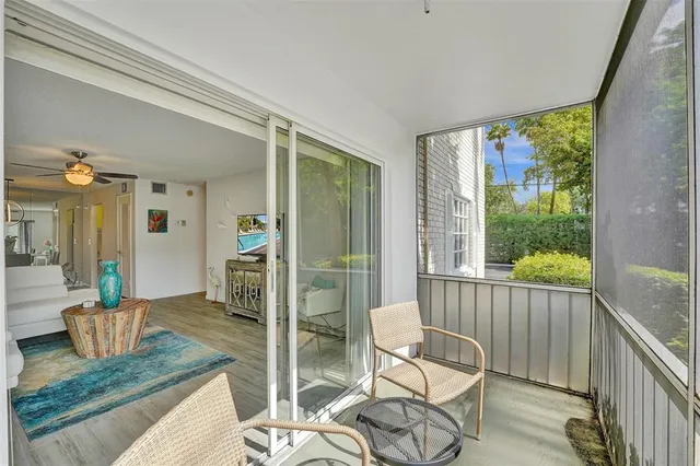 a bedroom with a bed and a table in it