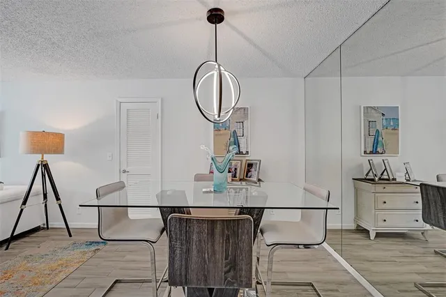 a picture of a room with a sink and a mirror