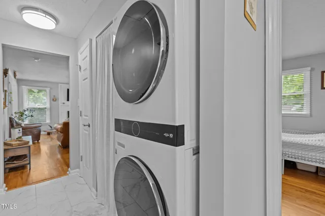 a view of a livingroom with furniture and fire place