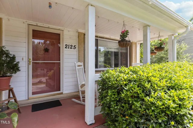 a front view of a house with a porch