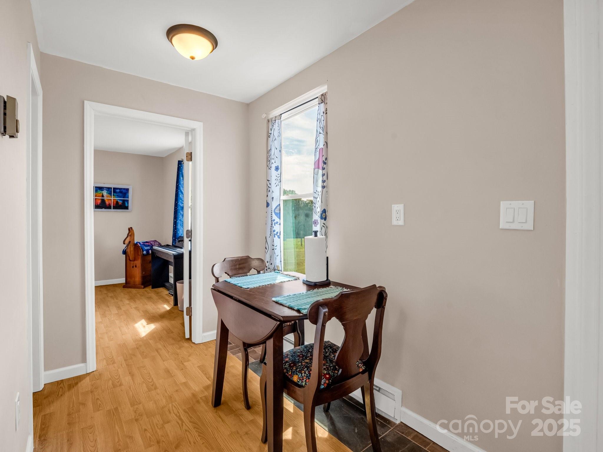 847 Crowe Dairy Road Forest City, NC 28043 - Photo 15 of 35 a living room with furniture and a window