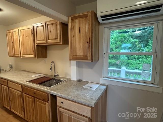 847 Crowe Dairy Road Forest City, NC 28043 - Photo 17 of 35 a kitchen with stainless steel appliances granite countertop a sink window and cabinets