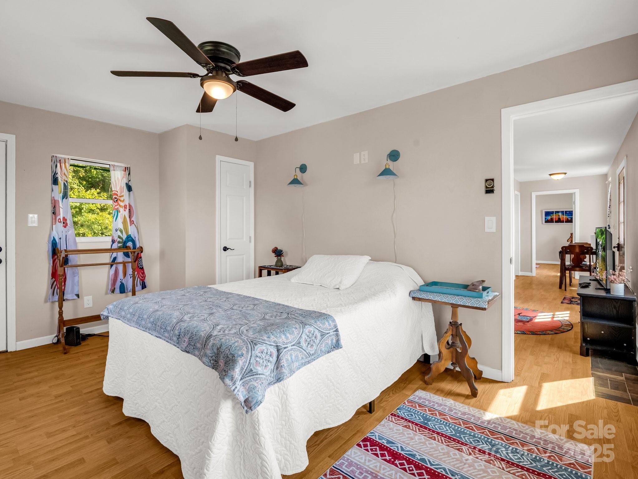 847 Crowe Dairy Road Forest City, NC 28043 - Photo 19 of 35 a bed room with a bed and furniture