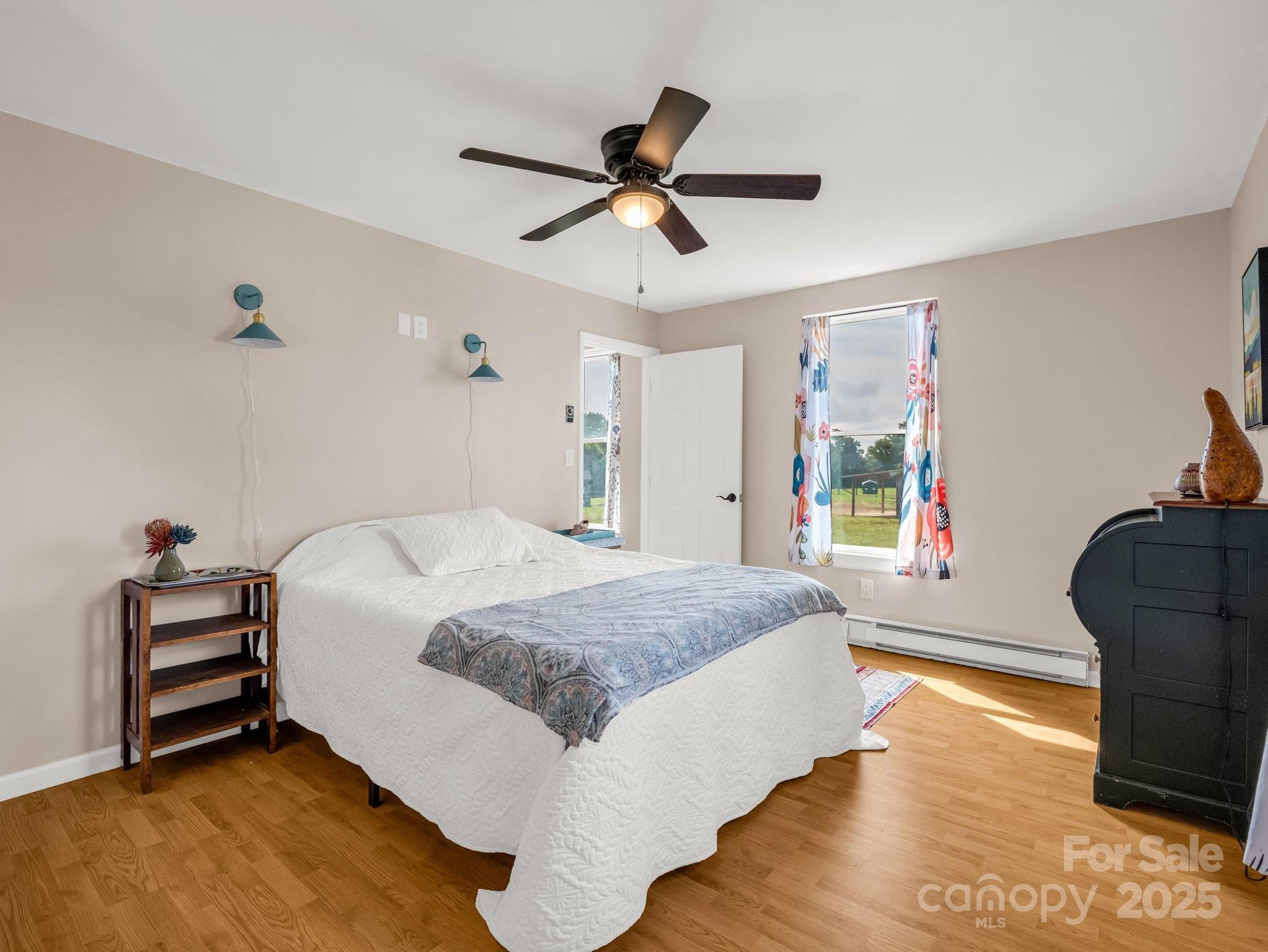 847 Crowe Dairy Road Forest City, NC 28043 - Photo 20 of 35 a bedroom with a bed and window