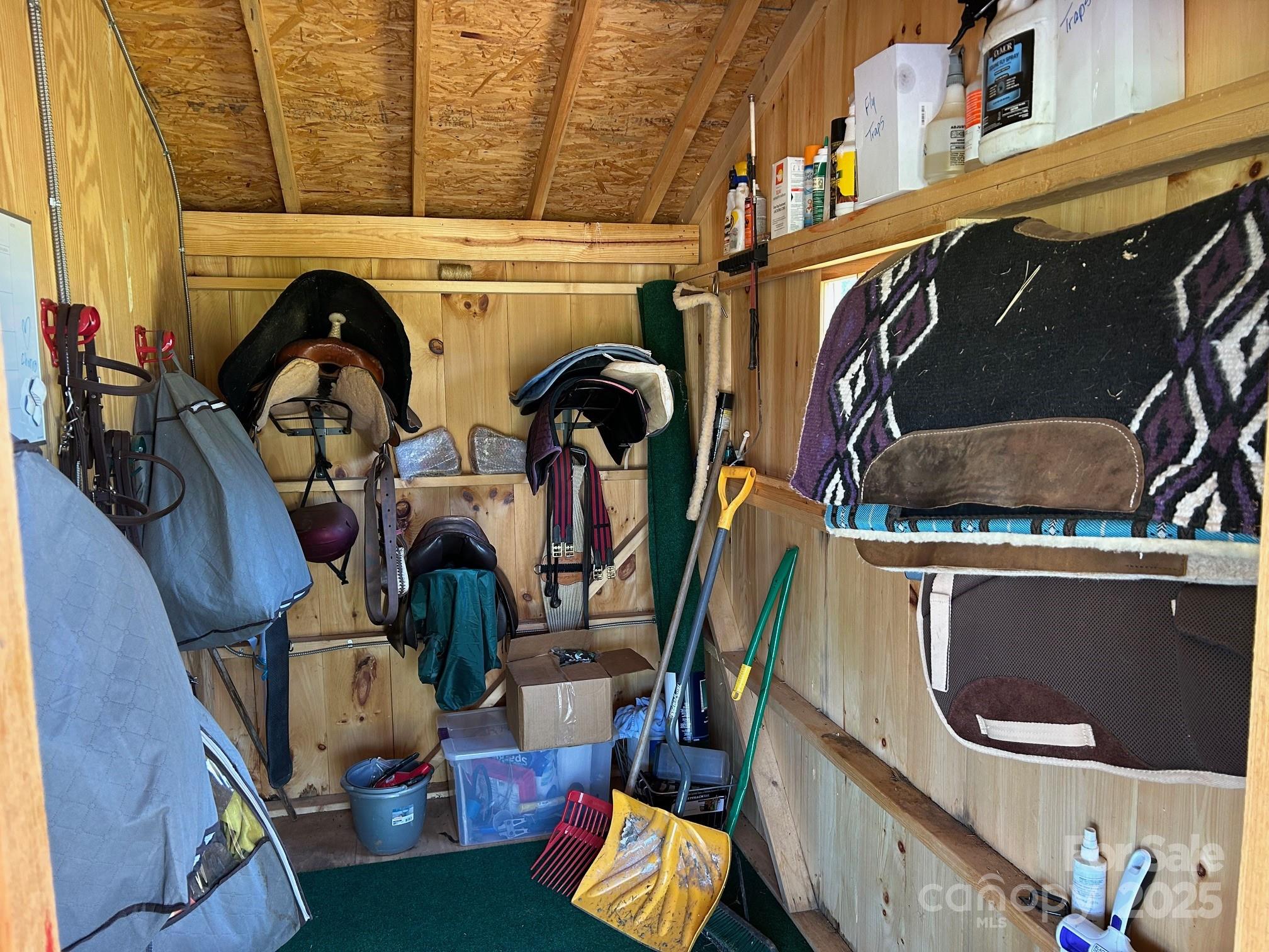 847 Crowe Dairy Road Forest City, NC 28043 - Photo 9 of 35 a view of walk in closet with clothes and shoes