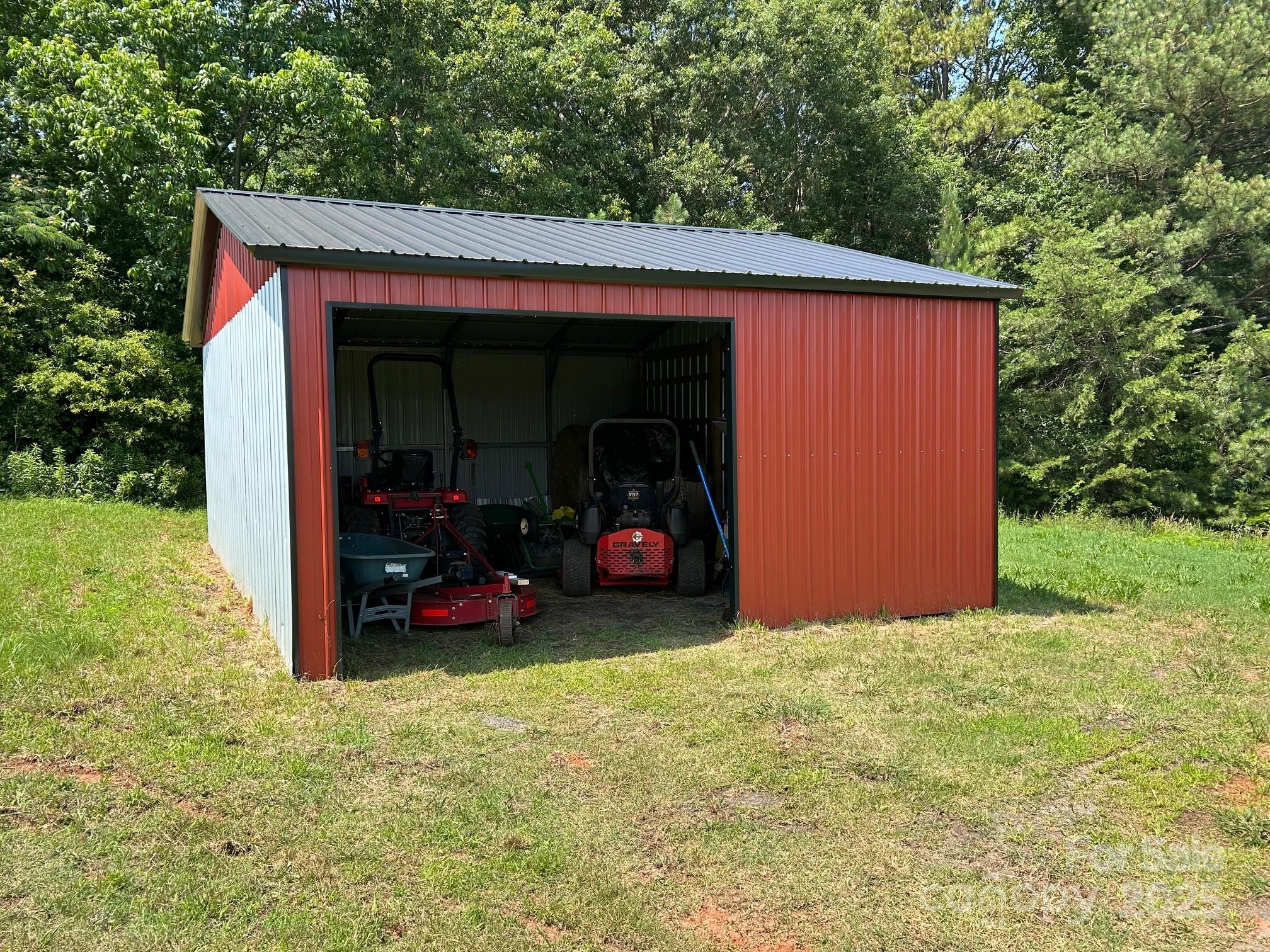 847 Crowe Dairy Road Forest City, NC 28043 - Photo 10 of 35 a view of a house with backyard and porch