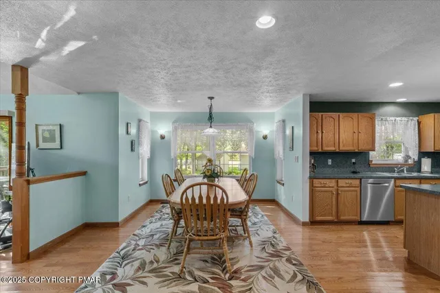 a large kitchen with granite countertop lots of counter top space
