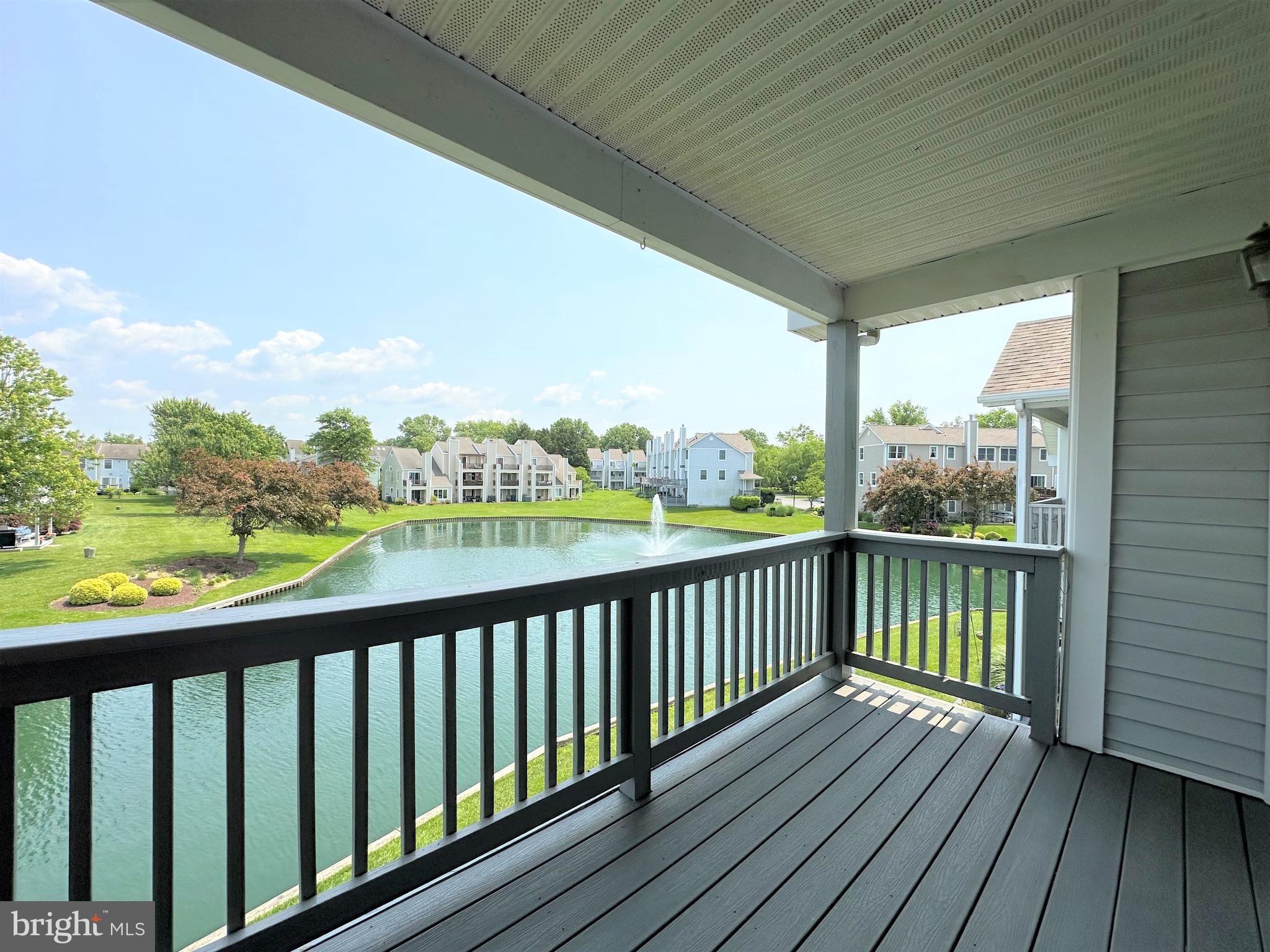 312 Teal Court, Unit F Chester, MD 21619 - Photo 3 of 25 Deck overlooking Pond