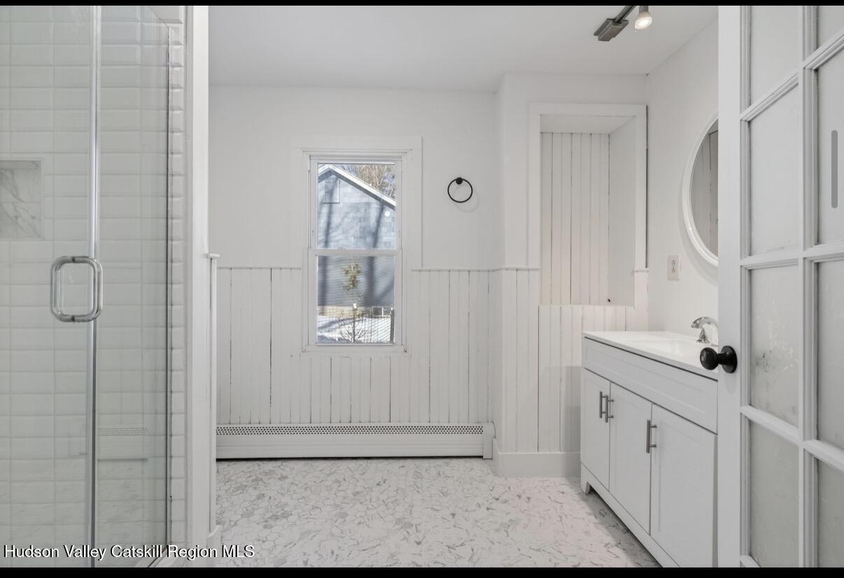 919 Elting Road Rosendale, NY 12472 - Photo 13 of 28 a bathroom with a sink and mirror