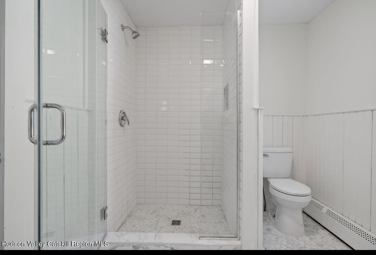 919 Elting Road Rosendale, NY 12472 - Photo 14 of 28 a bathroom with a shower and a toilet