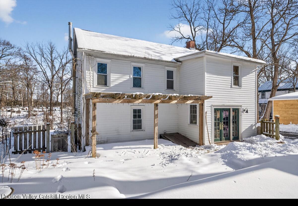 919 Elting Road Rosendale, NY 12472 - Photo 27 of 28 a view of a white house with snow on the road