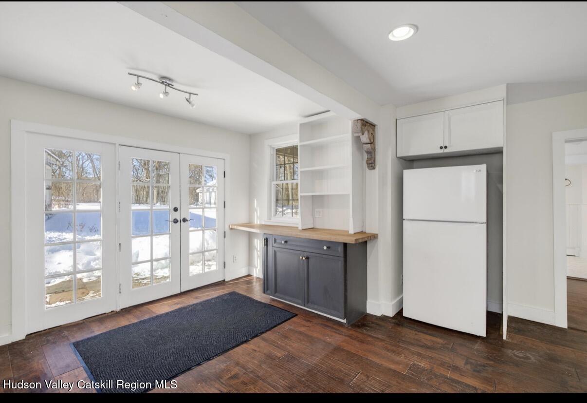919 Elting Road Rosendale, NY 12472 - Photo 7 of 28 a kitchen with granite countertop cabinets and wooden floor