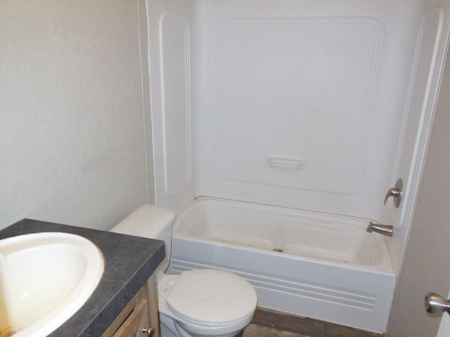 408 Bistineau Lake Road Ringgold, LA 71068 - Photo 3 of 10 a bathroom with a toilet and a bathtub