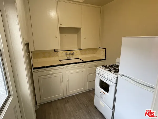 a utility room with washer and dryer