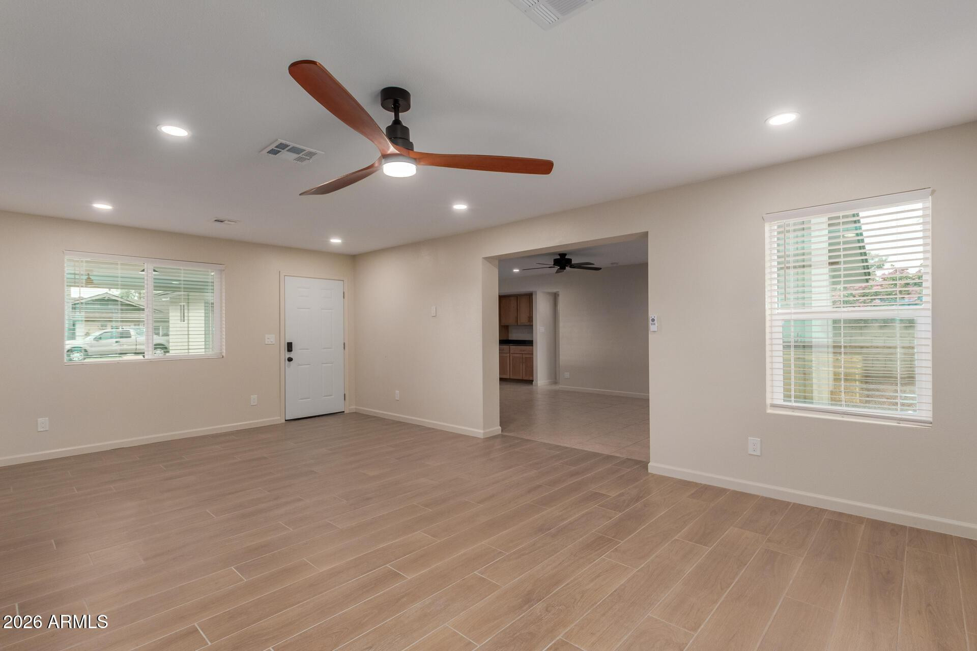 1628 East Del Rio Drive Tempe, AZ 85282 - Photo 10 of 32 a view of an empty room with a window