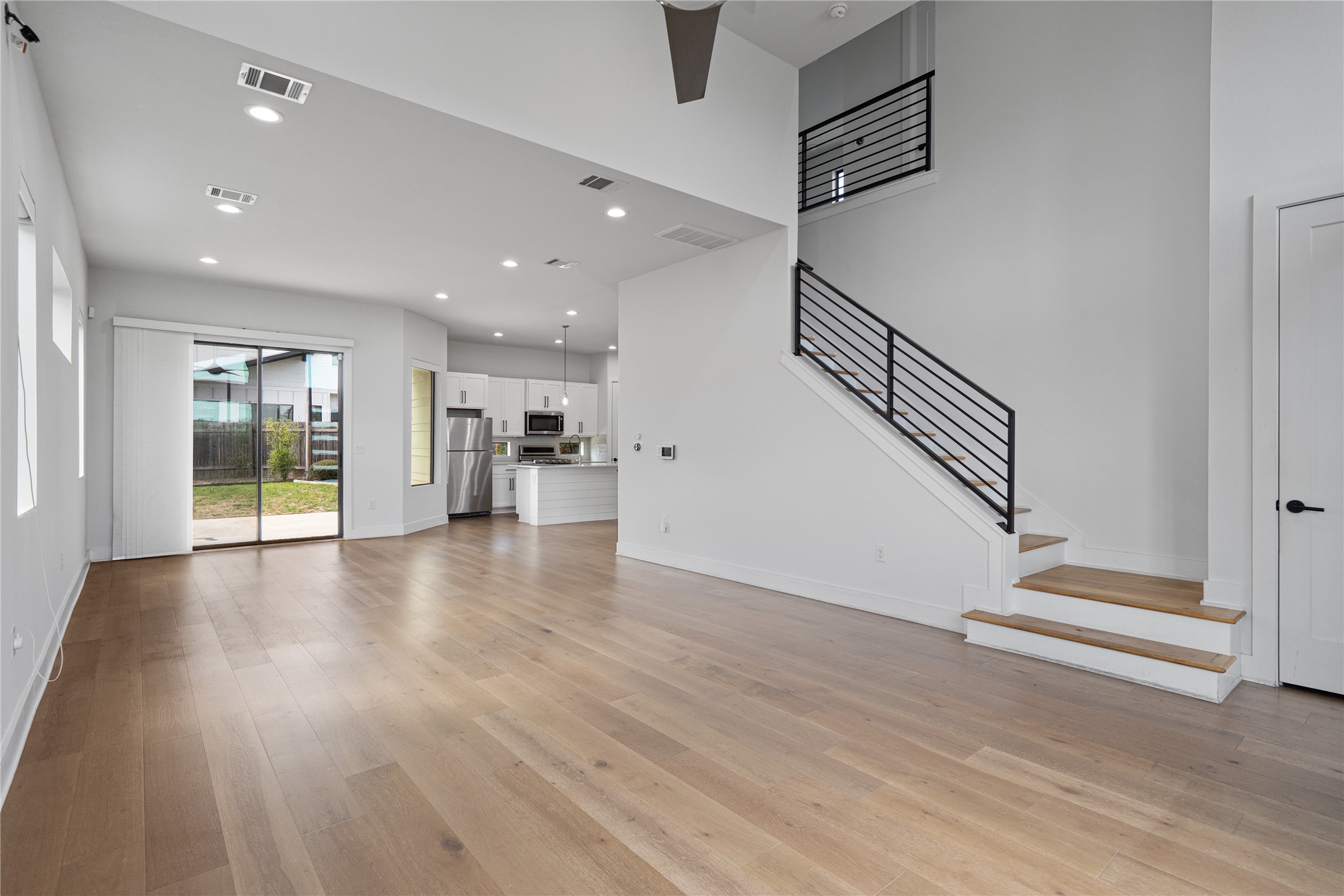409 Delmar Avenue, Unit 1 Austin, TX 78752 - Photo 1 of 33 a view of entryway and hall with wooden floor