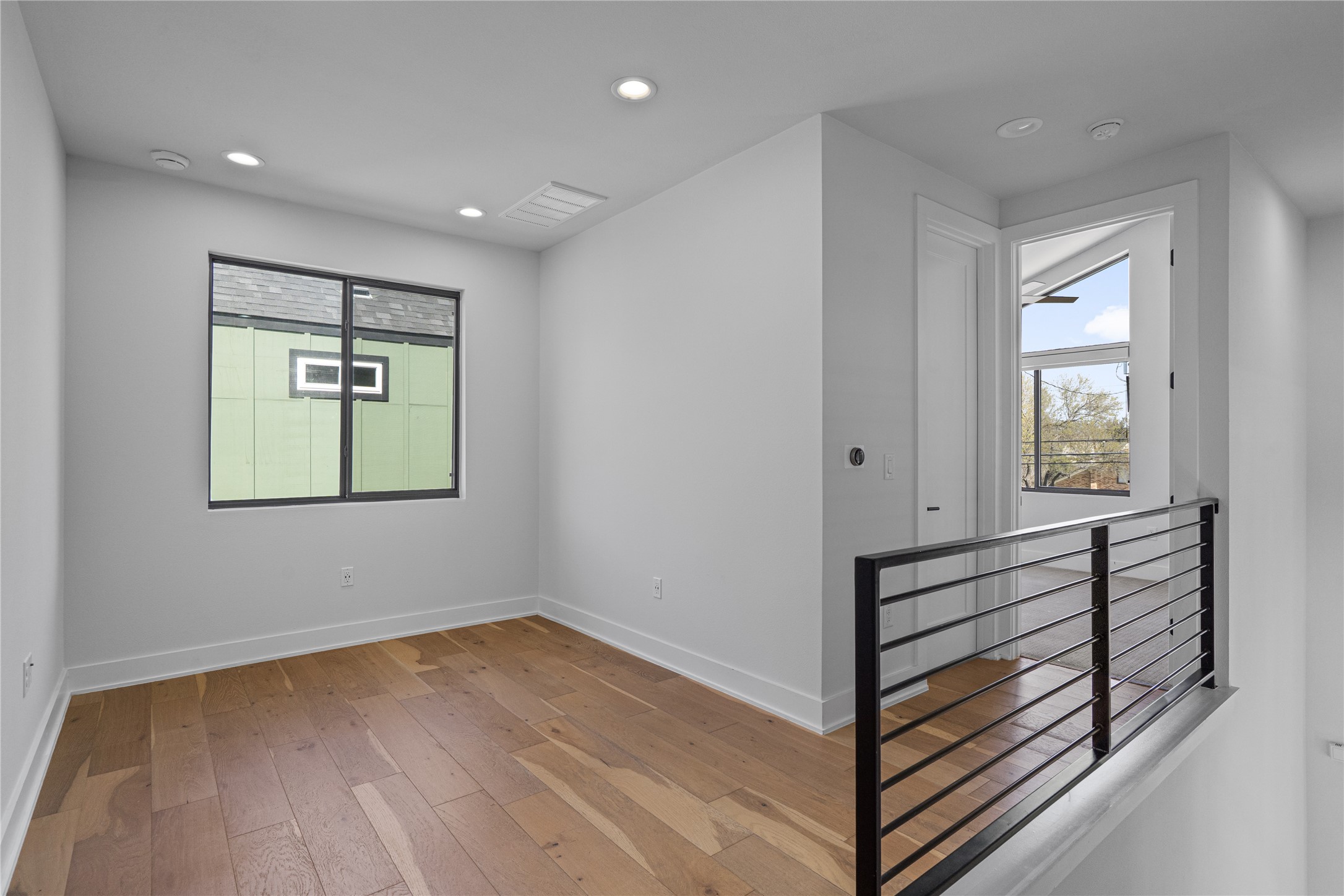 409 Delmar Avenue, Unit 1 Austin, TX 78752 - Photo 15 of 33 a view of entryway with wooden floor