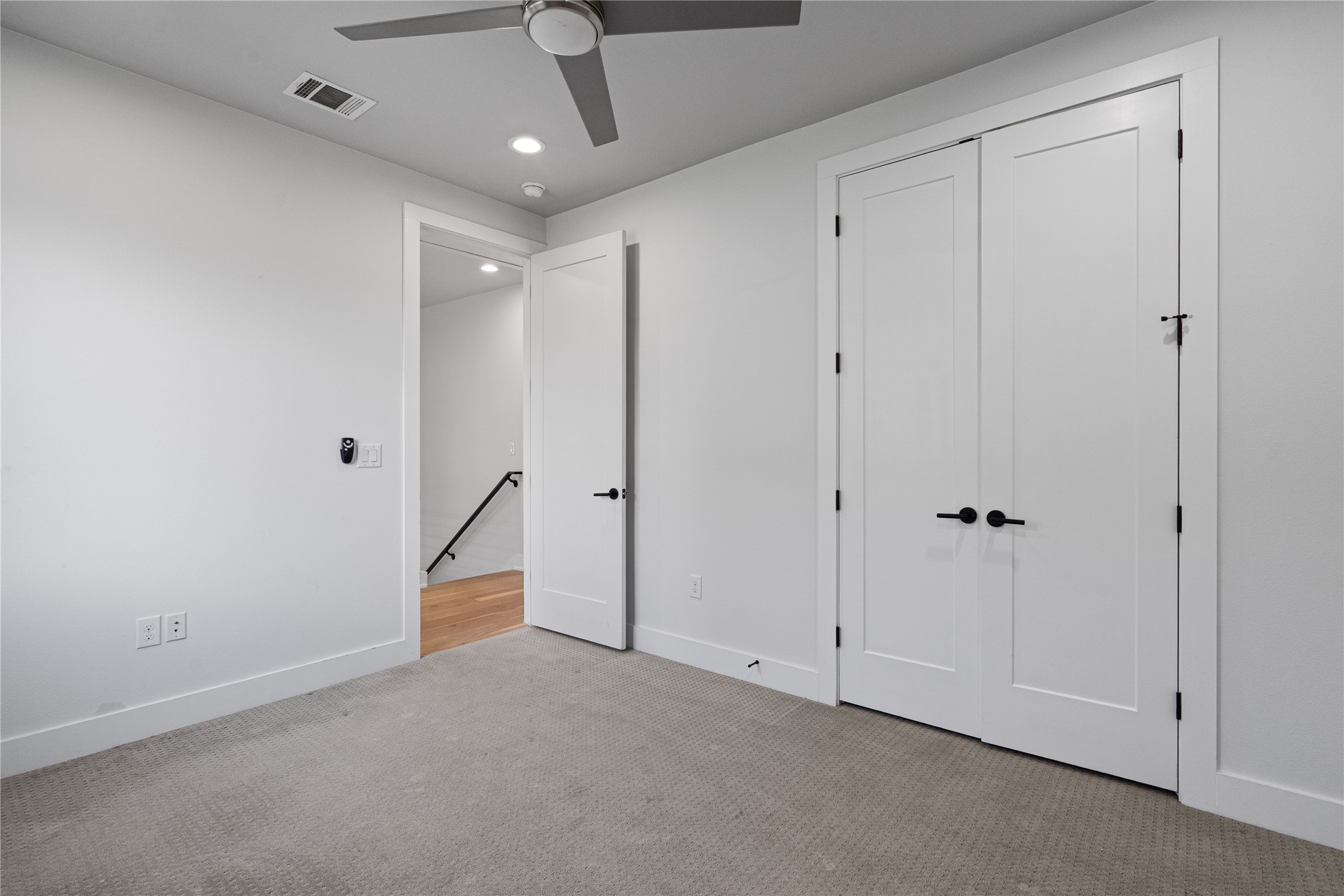 409 Delmar Avenue, Unit 1 Austin, TX 78752 - Photo 23 of 33 a view of a livingroom with a ceiling fan & entryway