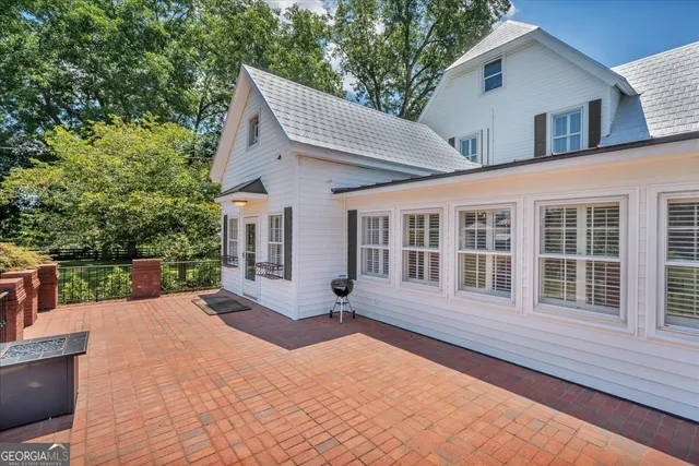 a view of a garden with an ocean