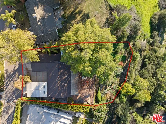 a view of a street with an outdoor seating