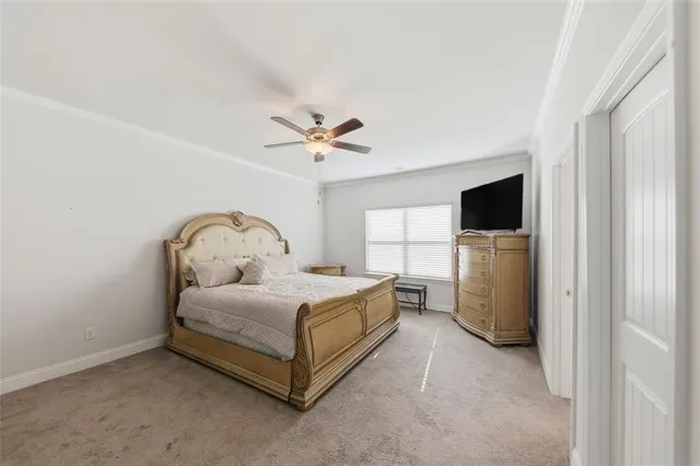 a bed room with a bed and a television