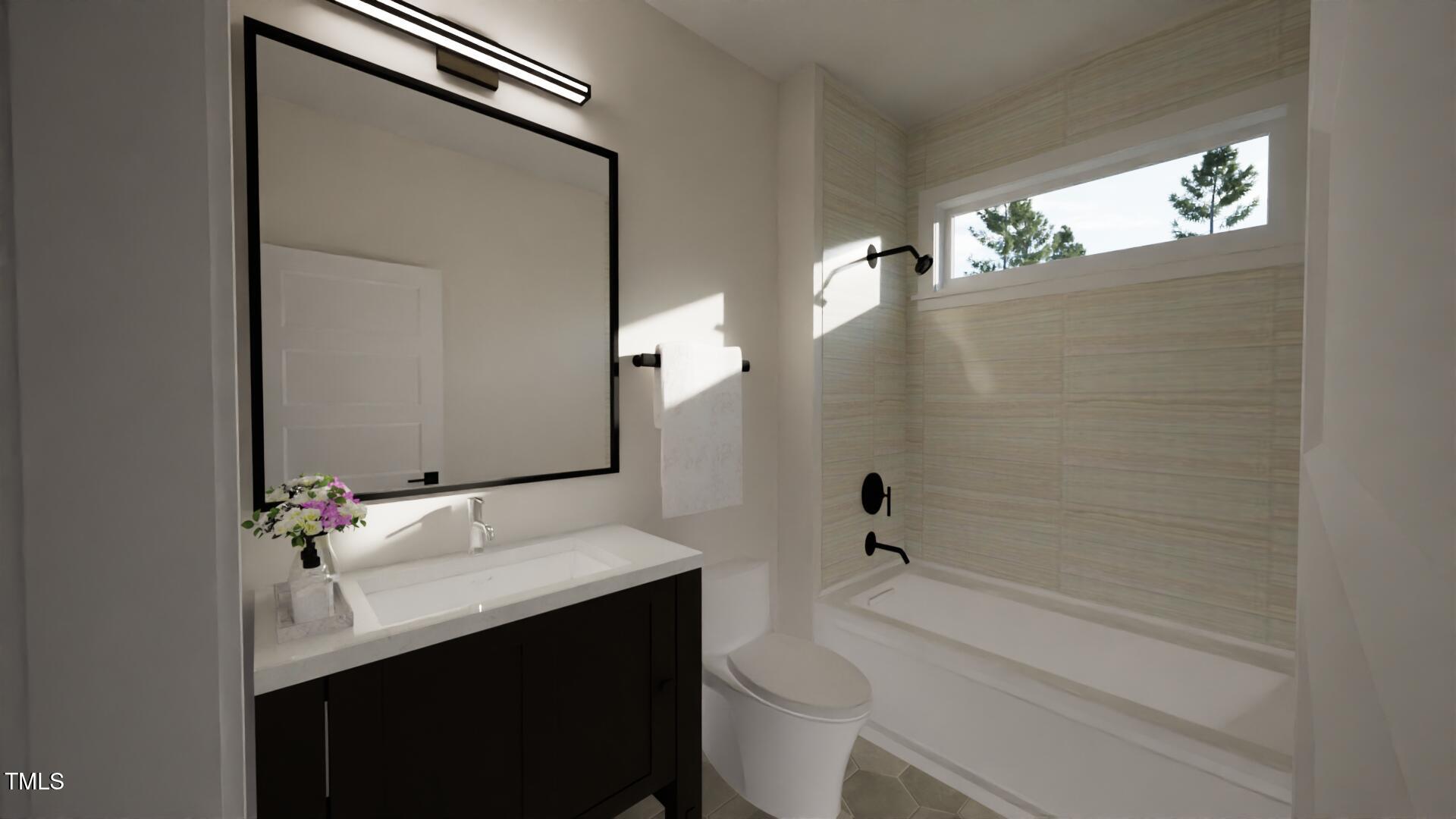 1806 Pershing Road Raleigh, NC 27608 - Photo 18 of 36 a bathroom with a sink a toilet and shower